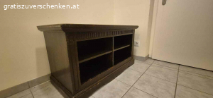 Fernsehbank zu verschenken. Schöne dunkelbraune Fernsehbank zu verschenken. Leichte Gebrauchspuren. Mit Fächern. Habe leider keinen Platz mehr dafür in der neuen Wohnung.
