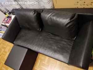Sofa zu verschenken. Sofa schwarz Kunststoffleder mit Bettfunktion zu verschenken